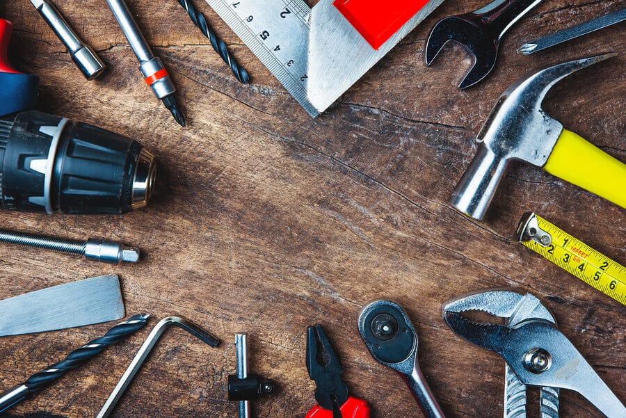 Tools on a table used to bring metal building ideas to life