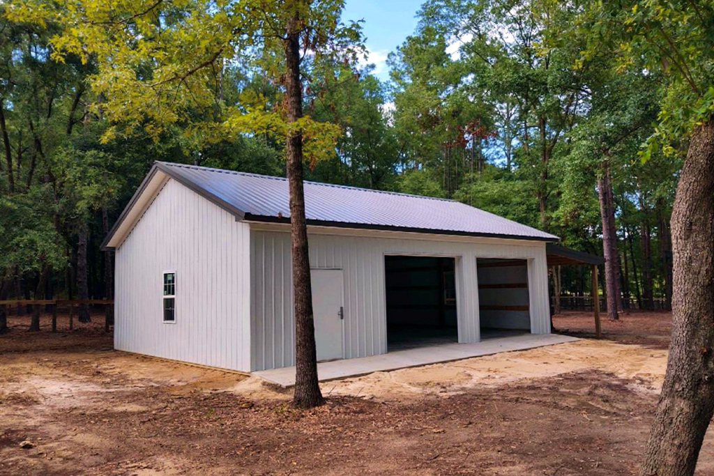 Woodville, LA pole barn with metal roof and door