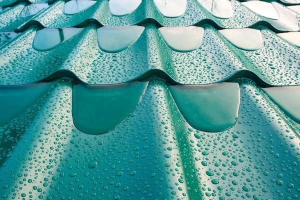 Water pooling on the surface of a metal roof may cause issues, highlighting how important it is to know how to repair a metal roof leak